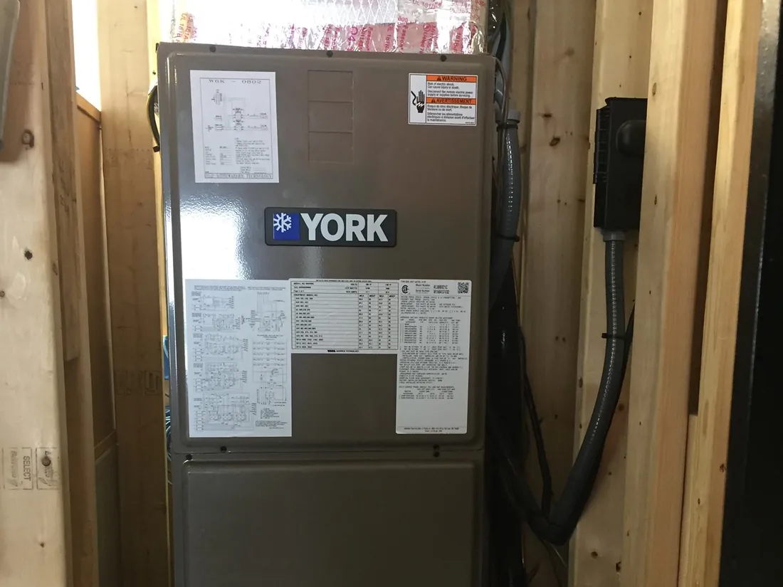 York air handler installed in a wood-framed closet