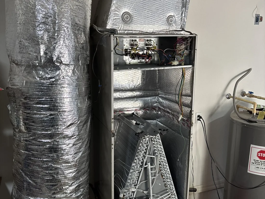Flex duct connected to an air handler in a utility space